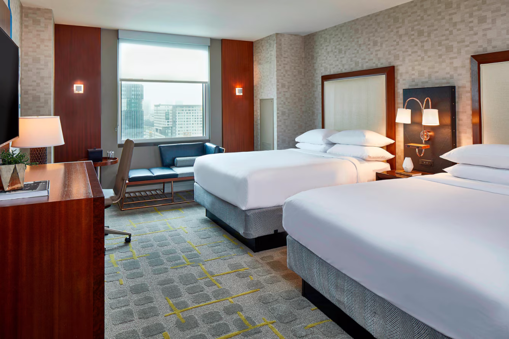 image of a hotel room overlooking the Atlanta skyline